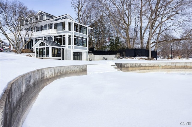 view of snow covered property