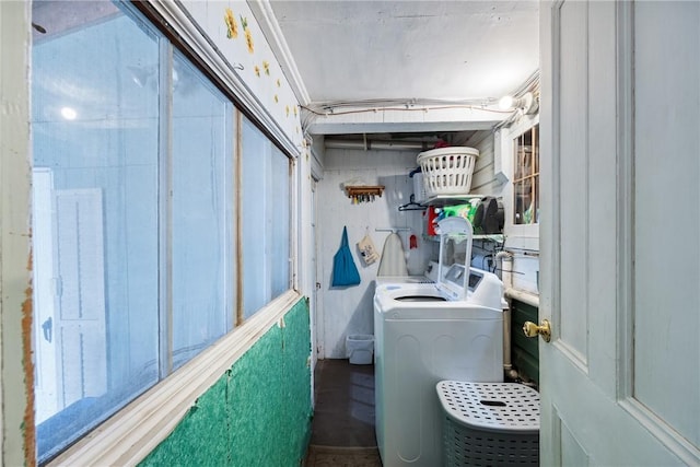 laundry area with separate washer and dryer