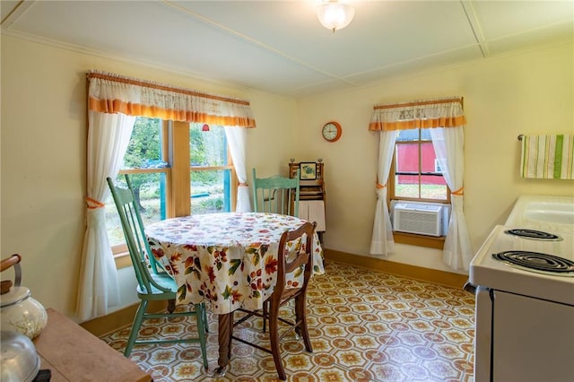 dining room featuring crown molding and cooling unit