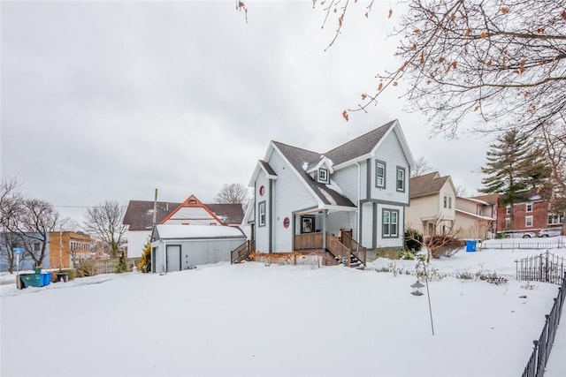 view of snow covered house