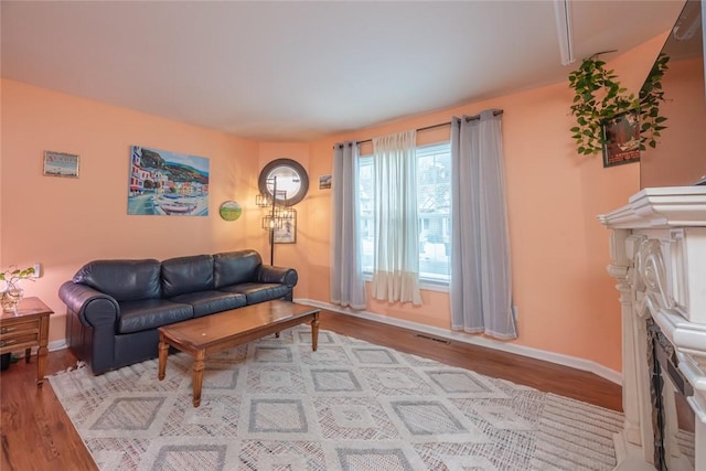 living room with light hardwood / wood-style floors