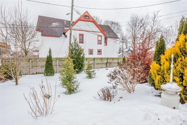 view of snow covered property