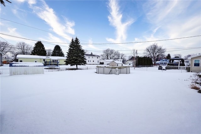 view of snowy yard