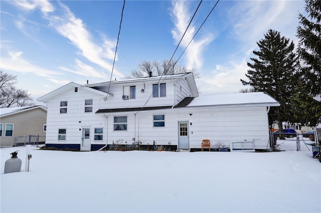 view of snow covered house