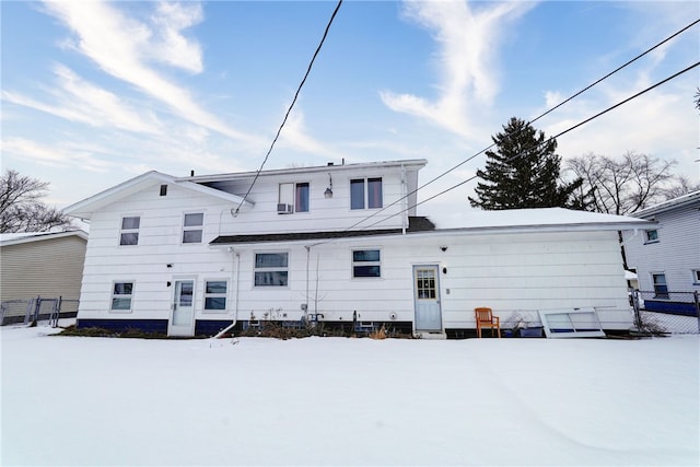 view of snow covered house