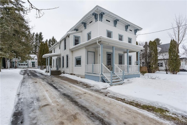 italianate home featuring covered porch