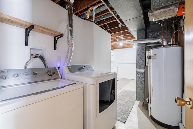 laundry area with independent washer and dryer and gas water heater