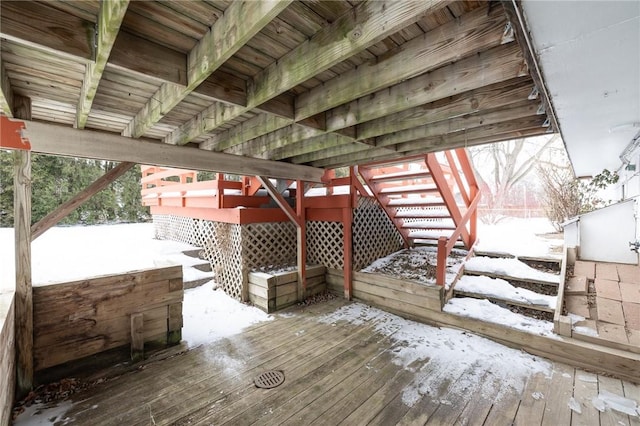 view of snow covered deck