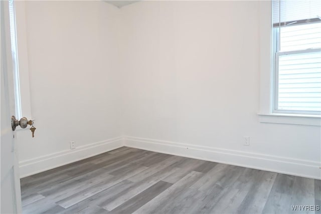 spare room featuring light hardwood / wood-style floors