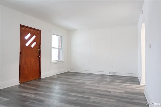 foyer with dark wood-type flooring