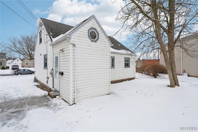 view of snow covered property