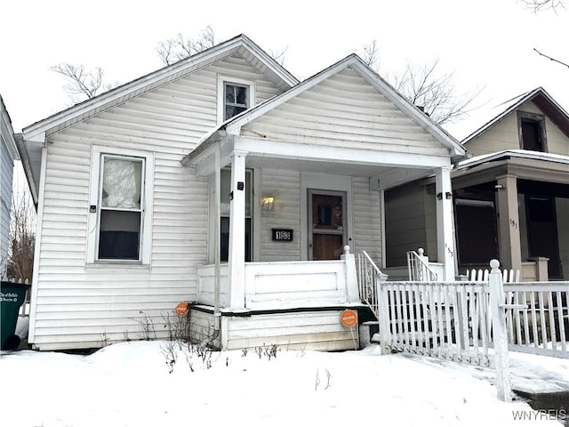 bungalow-style house featuring covered porch