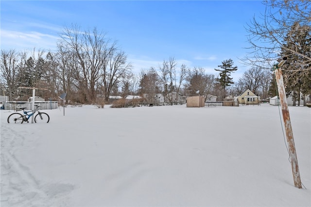 view of yard covered in snow