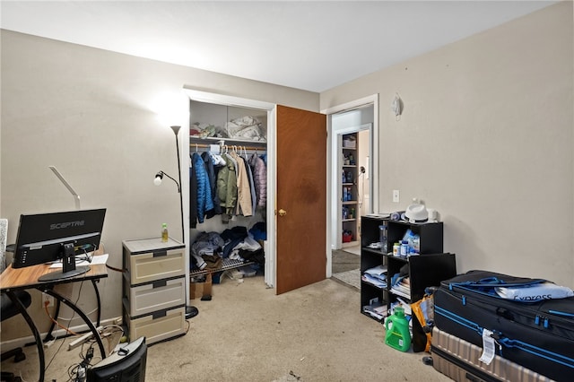 carpeted bedroom featuring a closet