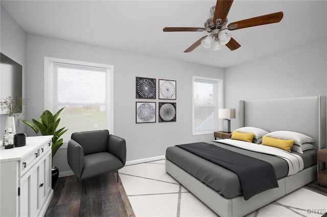 bedroom featuring ceiling fan and light hardwood / wood-style flooring