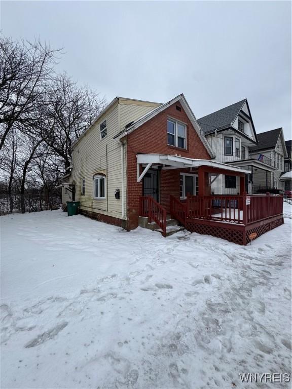 view of snow covered property