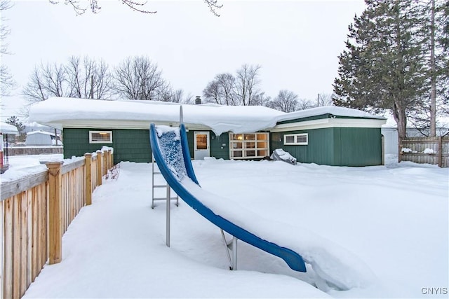 view of snow covered house