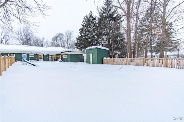 exterior space with a storage shed