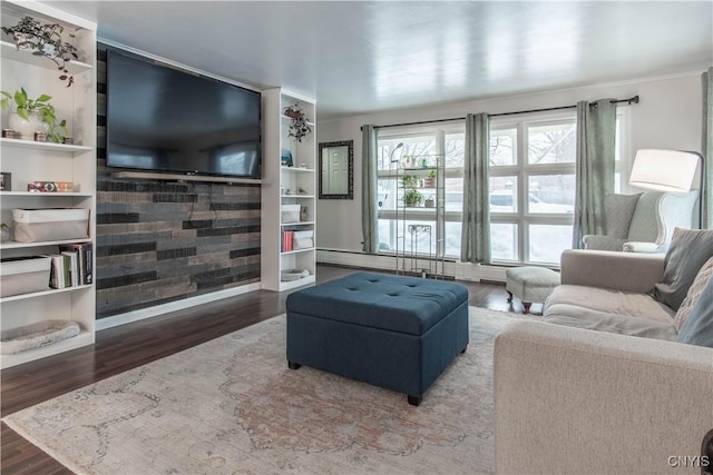 living room featuring crown molding and hardwood / wood-style floors