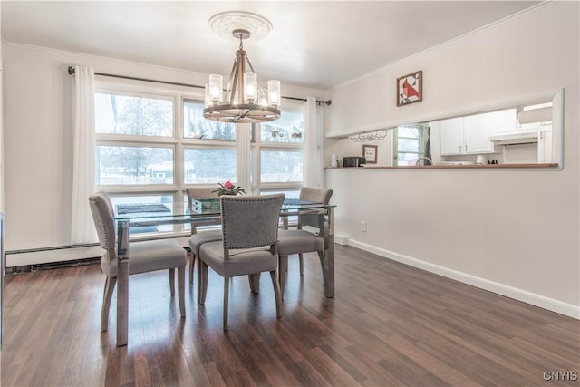 dining space with crown molding, plenty of natural light, and dark hardwood / wood-style floors