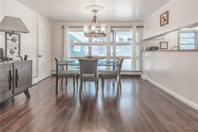 dining area featuring crown molding, plenty of natural light, and dark hardwood / wood-style flooring