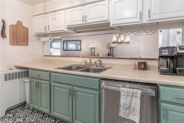 kitchen featuring light tile patterned flooring, radiator, dishwasher, sink, and white cabinets