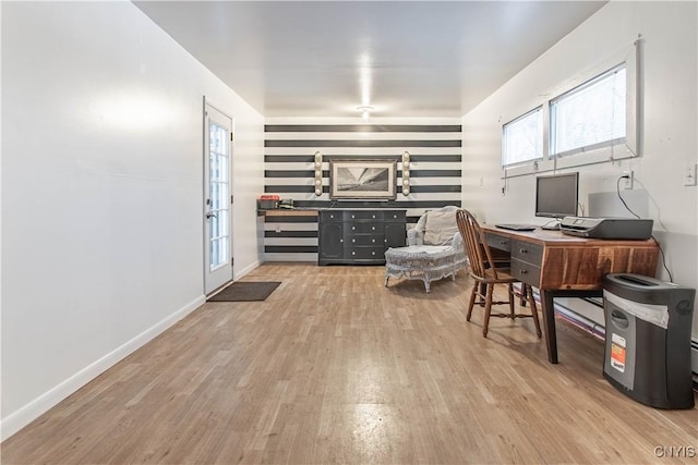 office space with light hardwood / wood-style floors