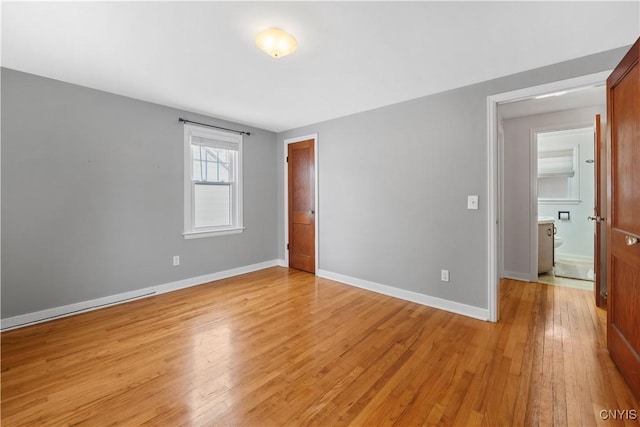 unfurnished bedroom with light hardwood / wood-style flooring