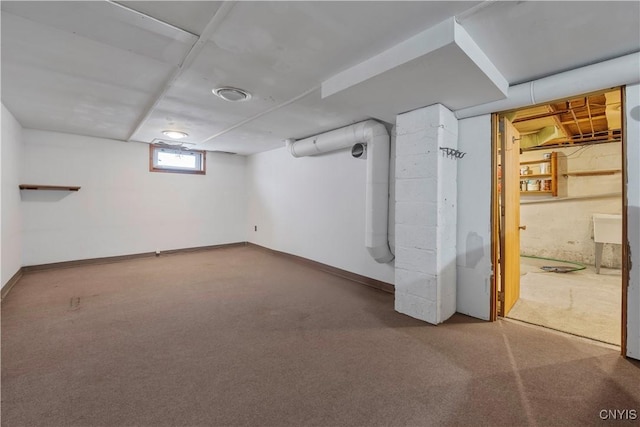 basement with carpet flooring