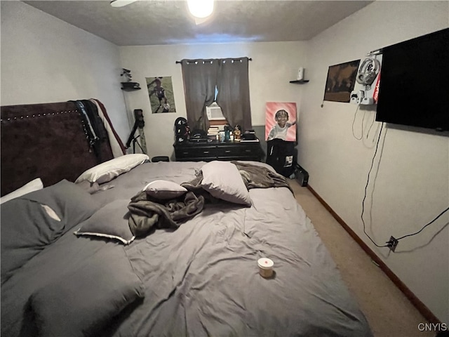 bedroom featuring carpet