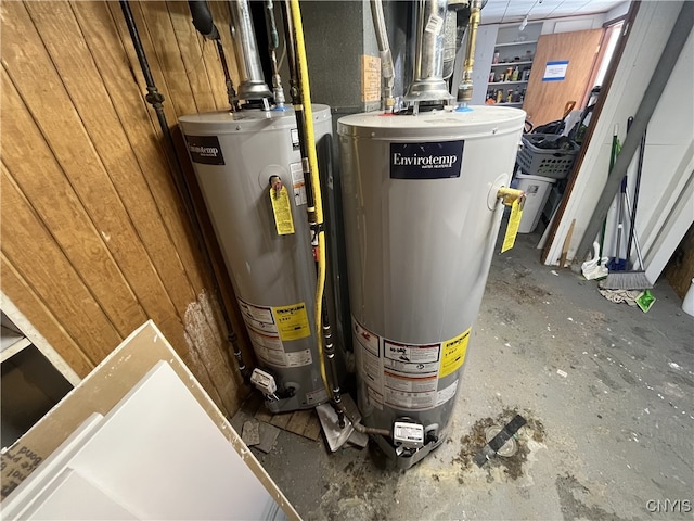 utility room with gas water heater