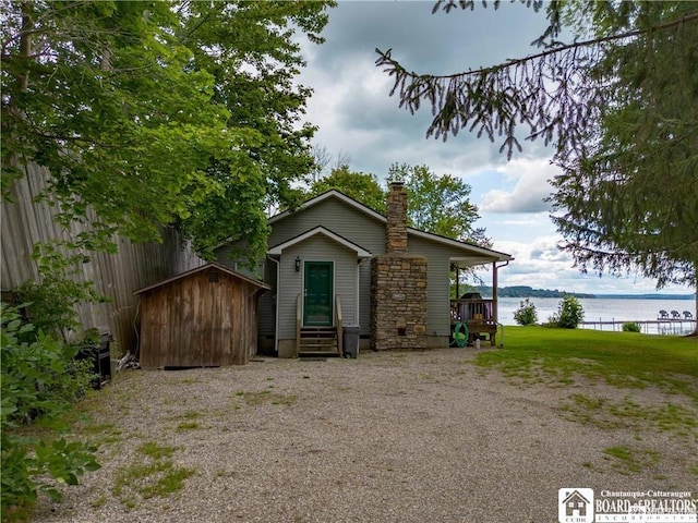 view of front of home featuring a water view