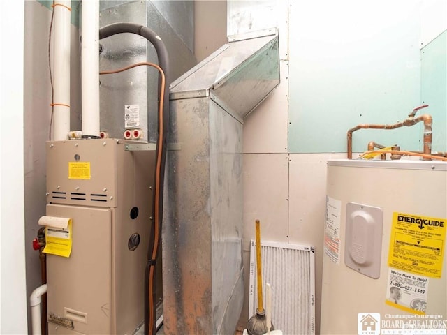 utility room featuring electric water heater