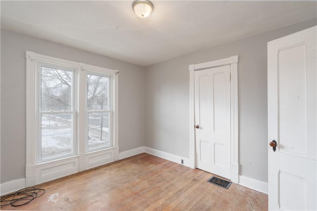 unfurnished bedroom featuring light hardwood / wood-style floors