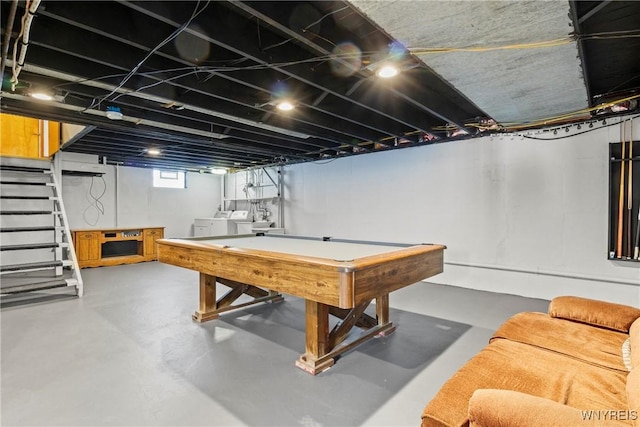 playroom featuring billiards, concrete flooring, and washer and clothes dryer