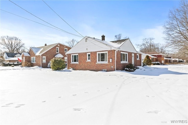 view of snow covered property