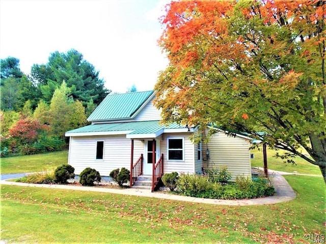 view of front of home with a front yard