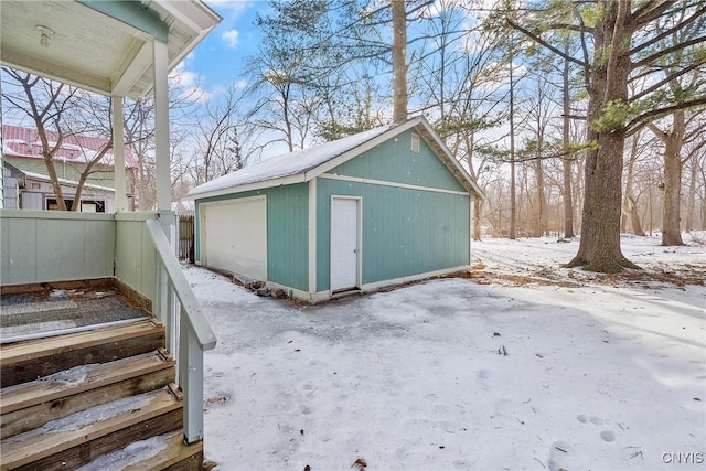 view of snow covered garage