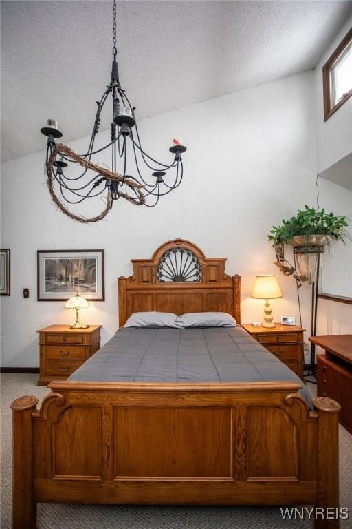 unfurnished bedroom with vaulted ceiling, carpet floors, and a textured ceiling