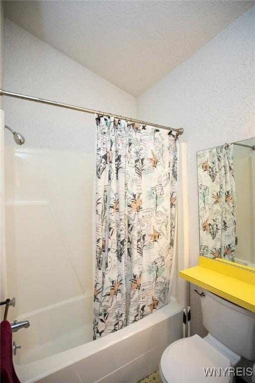 bathroom featuring lofted ceiling, shower / tub combo, and toilet