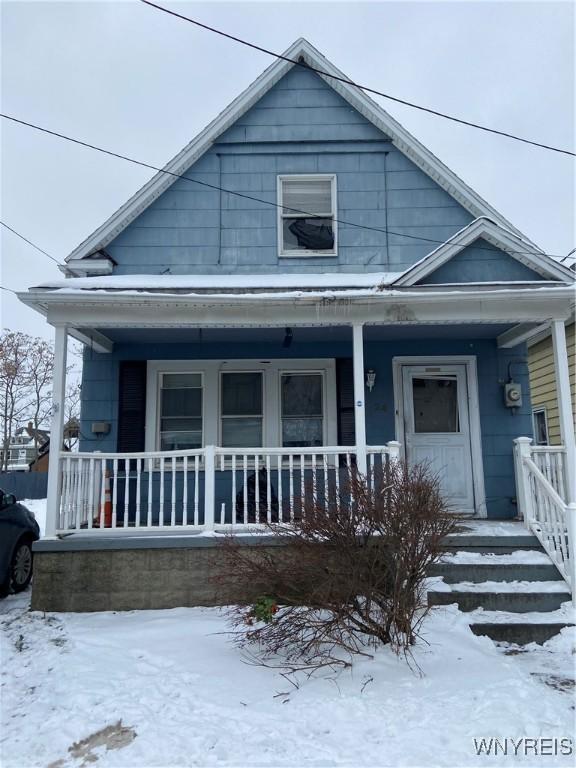 bungalow-style house featuring covered porch