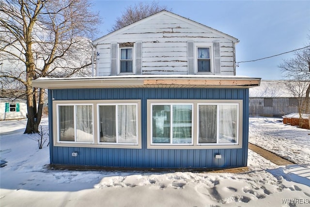 view of snow covered property