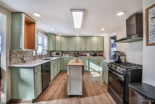 kitchen featuring a kitchen island, wood counters, black dishwasher, stainless steel range with gas stovetop, and wall chimney exhaust hood