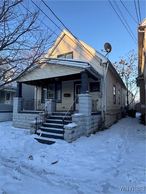 bungalow-style home with a porch