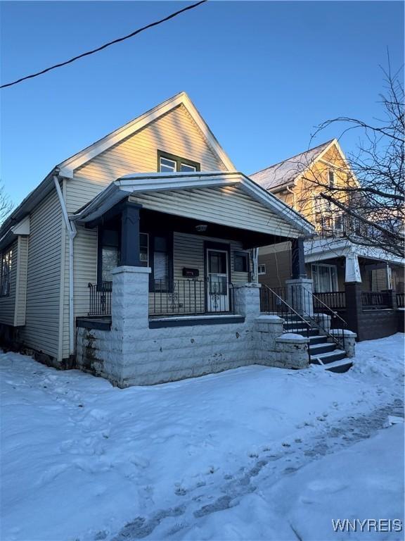 bungalow-style home with covered porch