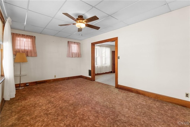1407 Downer Ave, Utica, NY 13502 - carpeted spare room with a paneled ceiling and a ceiling fan