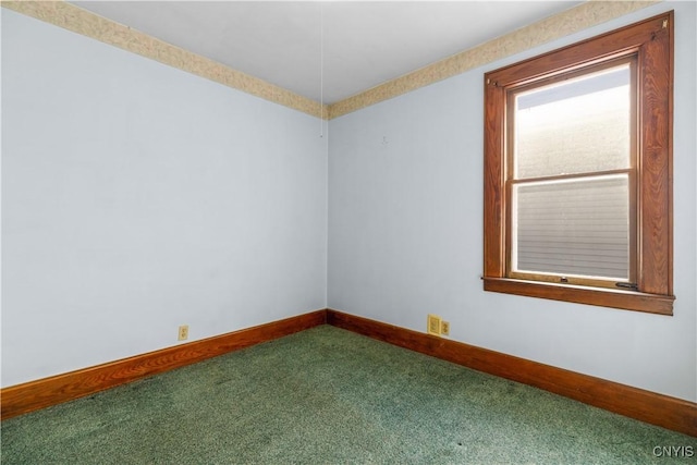 1407 Downer Ave, Utica, NY 13502 - carpeted empty room with baseboards