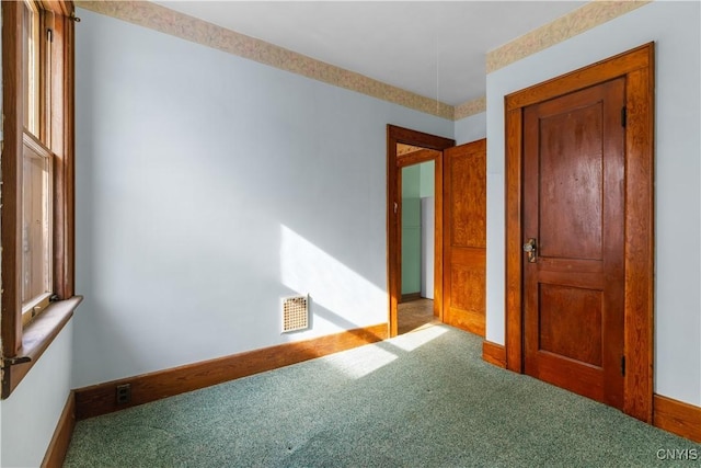 1407 Downer Ave, Utica, NY 13502 - unfurnished bedroom with carpet flooring and baseboards