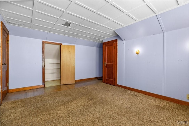 1407 Downer Ave, Utica, NY 13502 - carpeted spare room featuring baseboards and wood finished floors
