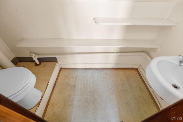 1407 Downer Ave, Utica, NY 13502 - half bath featuring toilet and a sink